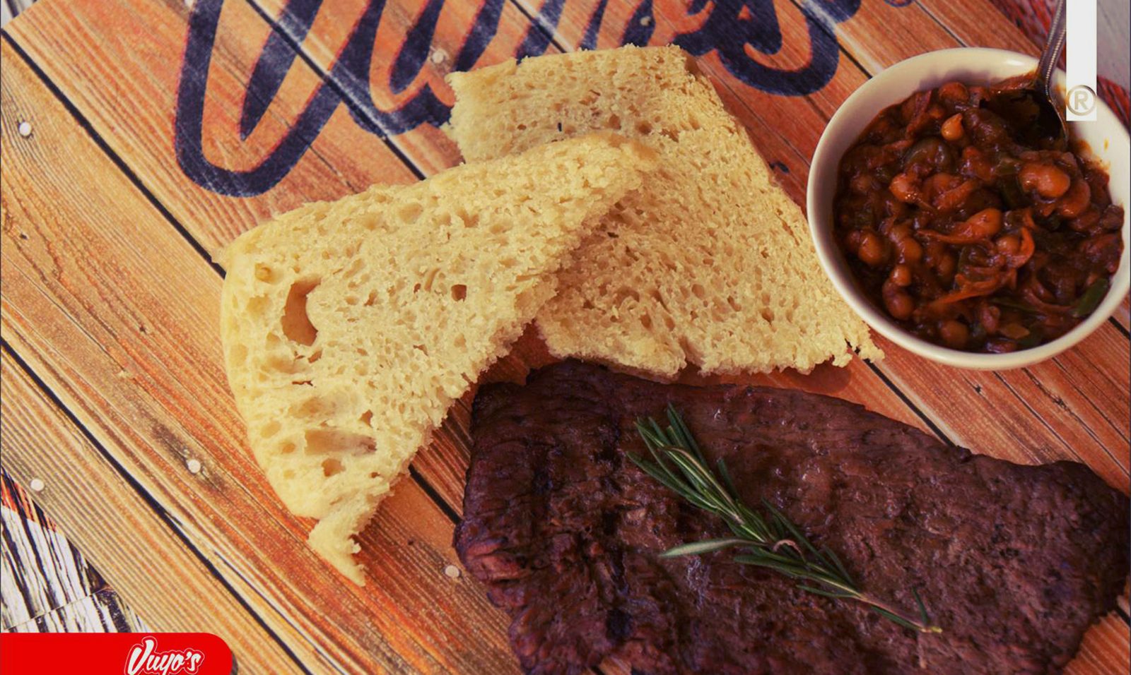 Grilled meat with bread and beans