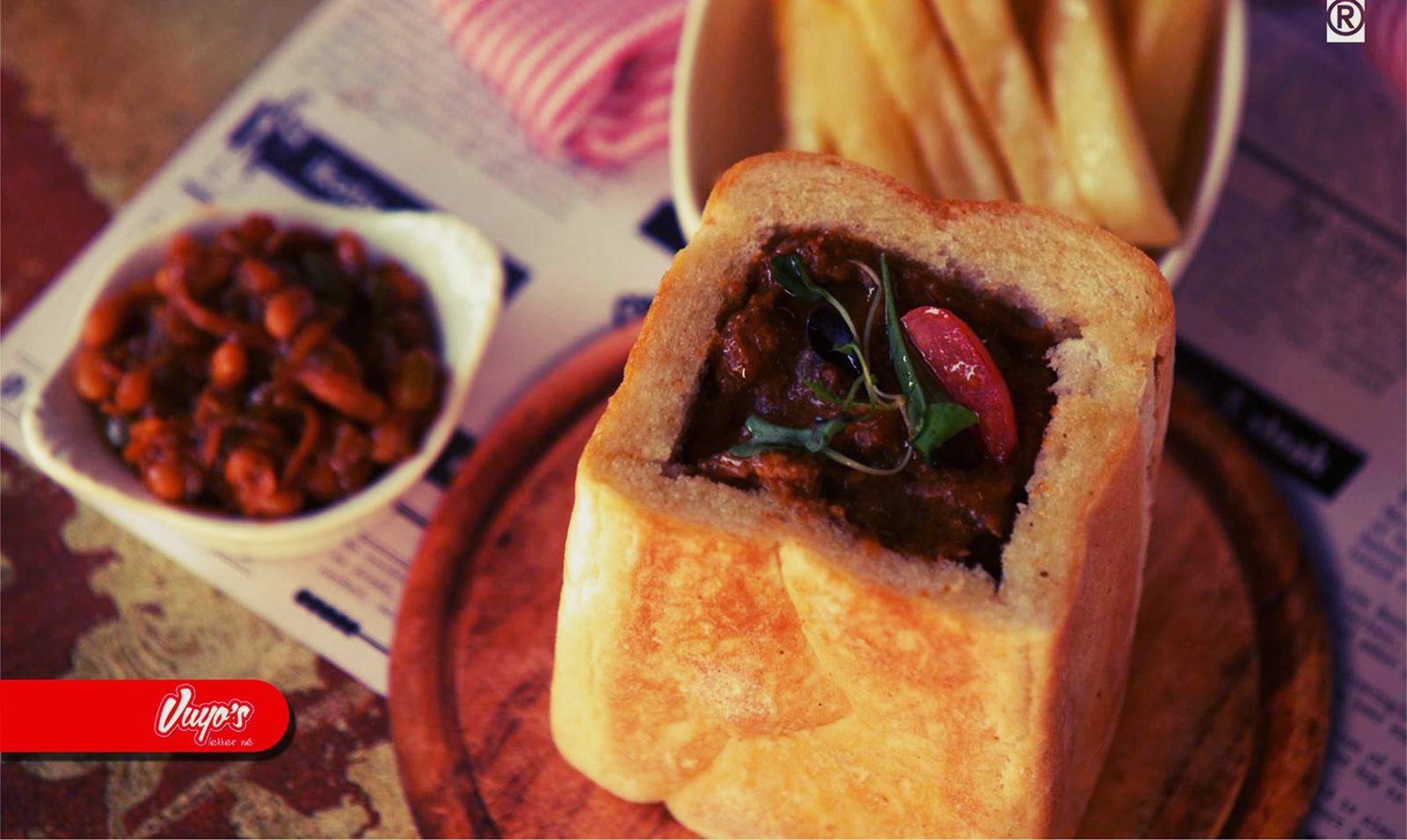 Vuyo's kota with chips and beans